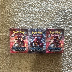 Pokemon Steam Siege Card boxes with full set of cards